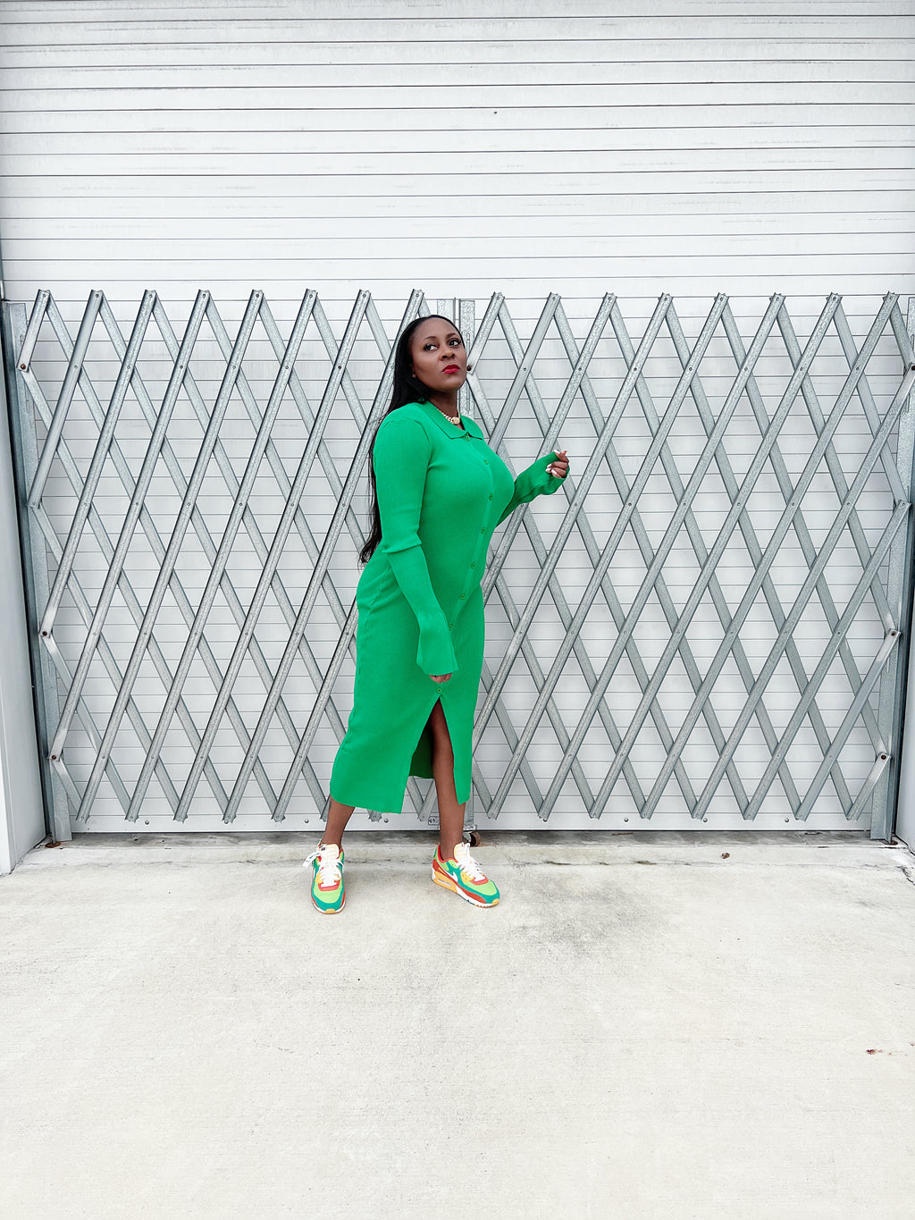 “Elegant green collared ribbed bell sleeve maxi dress with buttons, perfect for a chic and sophisticated look.”
