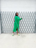 “Elegant green collared ribbed bell sleeve maxi dress with buttons, perfect for a chic and sophisticated look.”