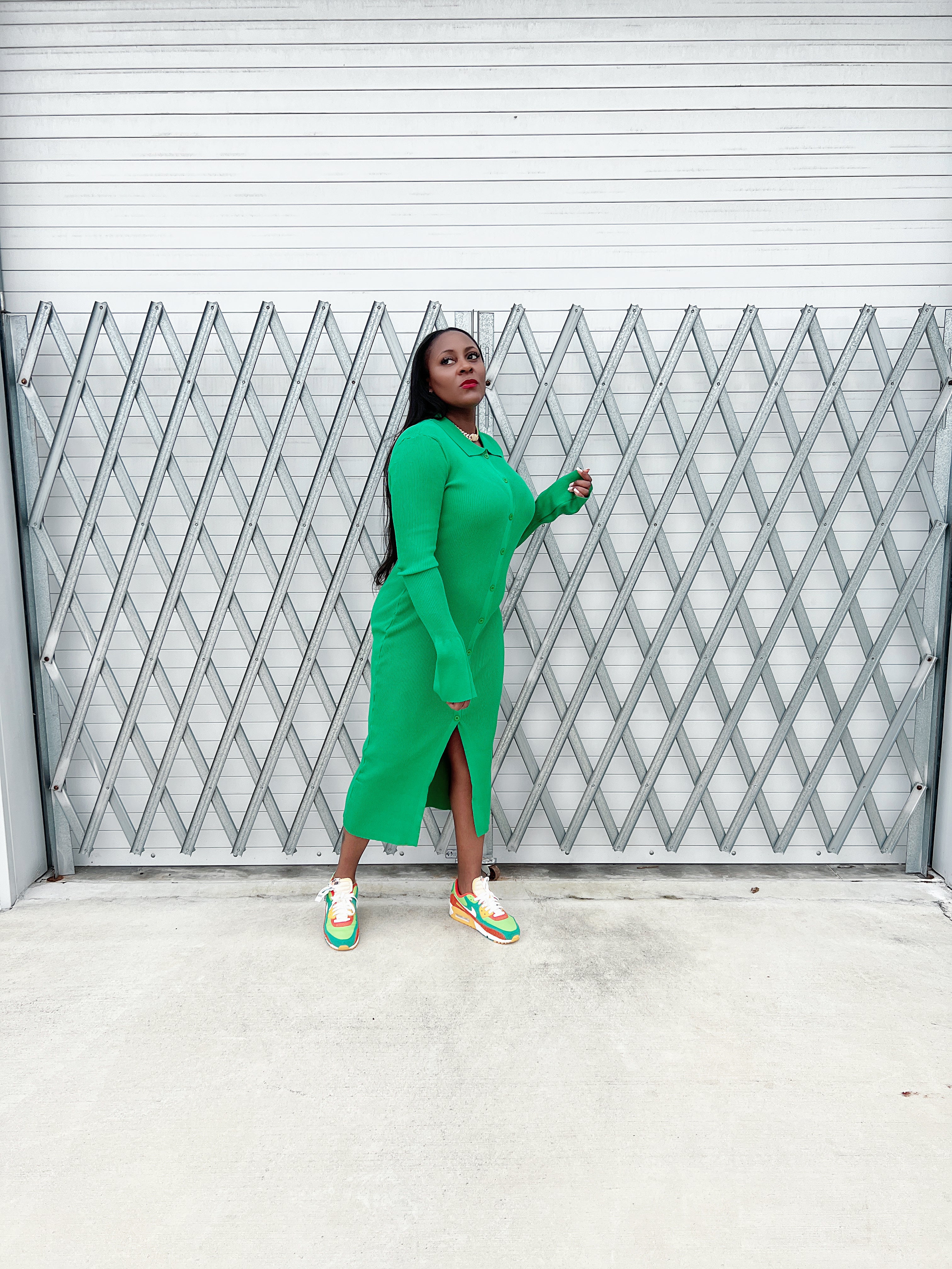 “Elegant green collared ribbed bell sleeve maxi dress with buttons, perfect for a chic and sophisticated look.”