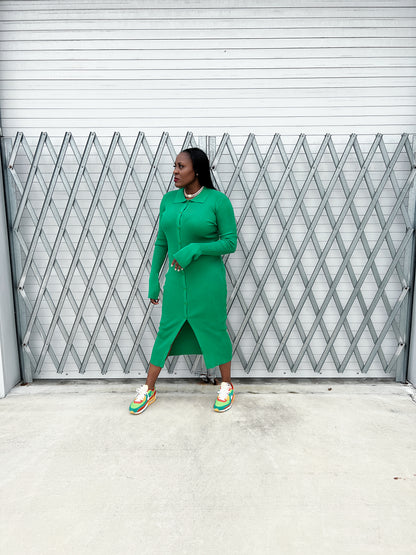 Stylish ribbed green maxi dress with a fitted silhouette, button-up front, and flowy bell sleeves.”