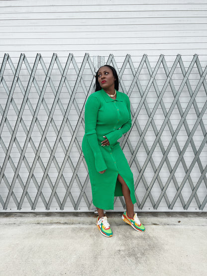 tylish ribbed green maxi dress with a fitted silhouette, button-up front, and flowy bell sleeves